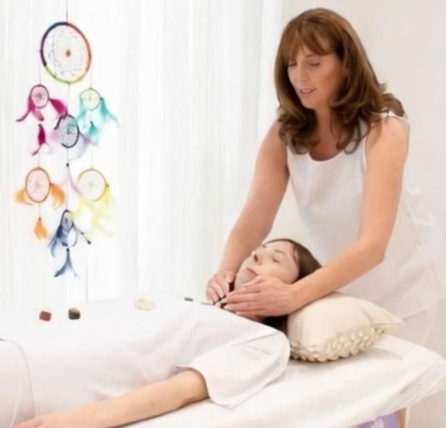 full body Reiki treatment in London helping relieve stress tension and emotional overwhelm
