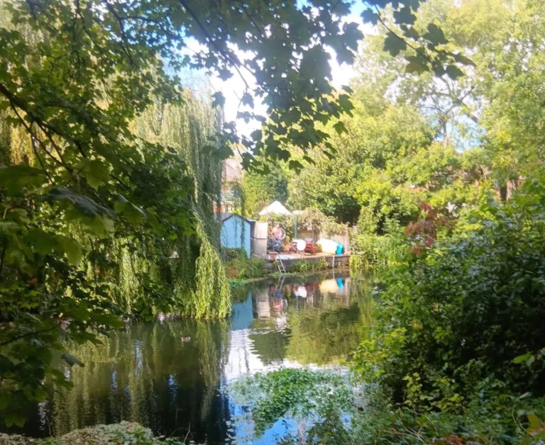calm riverside setting at holistic retreat in Enfield near River Lea for rest and reset