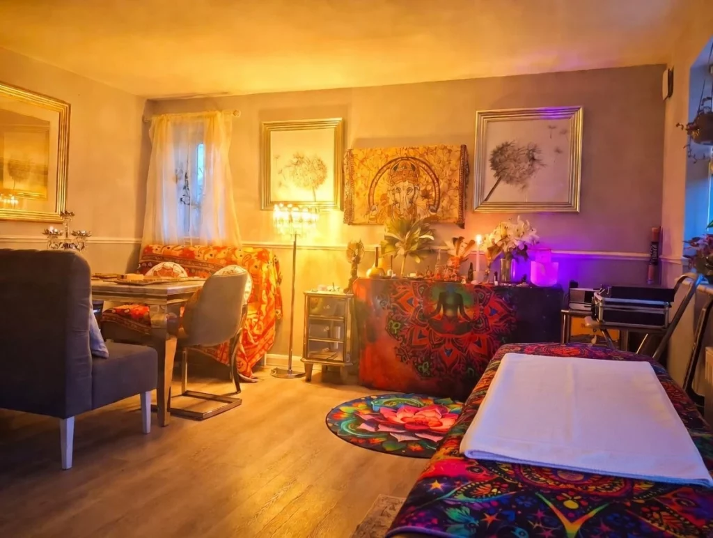 cosy holistic retreat space in Enfield with shrine area and peaceful dining setting