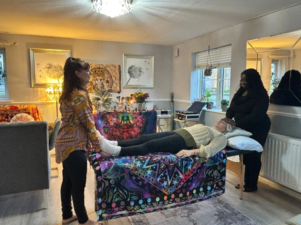 group Reiki training in Enfield with students practicing healing techniques at retreat